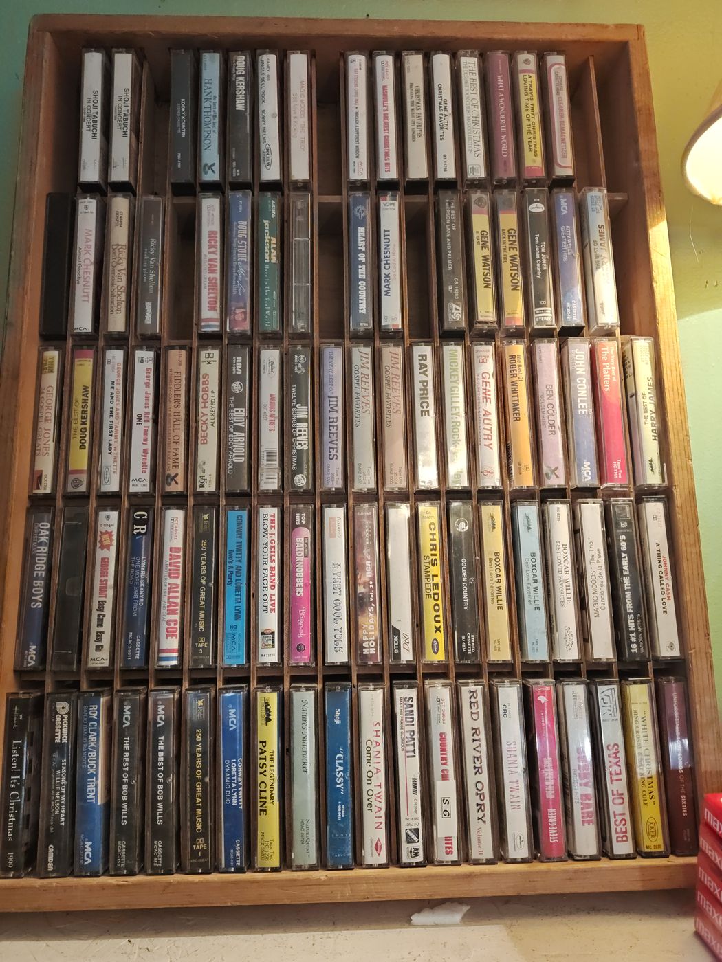 Wooden rack full of classic country cassette tapes