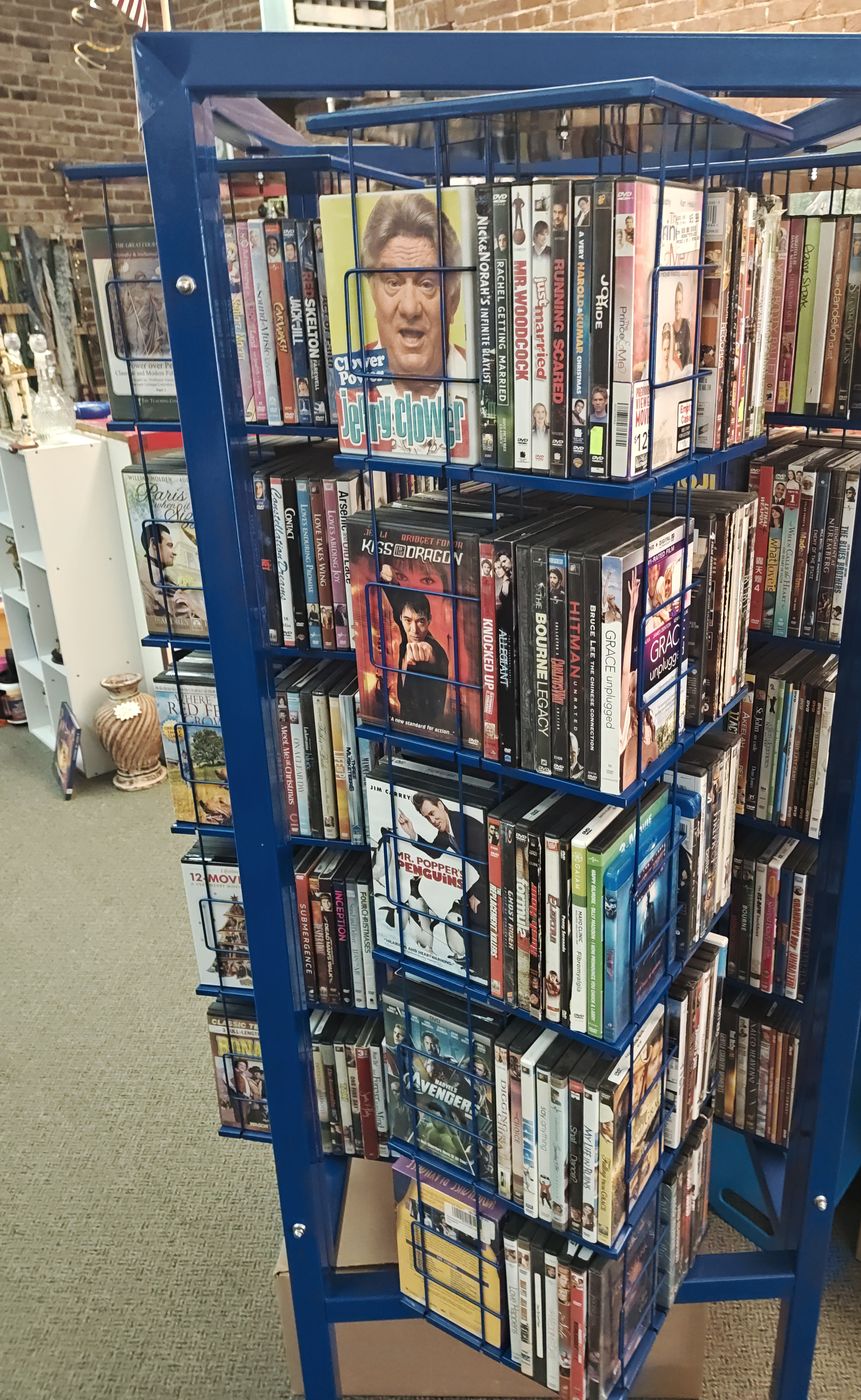 Rotating rack full of DVDs