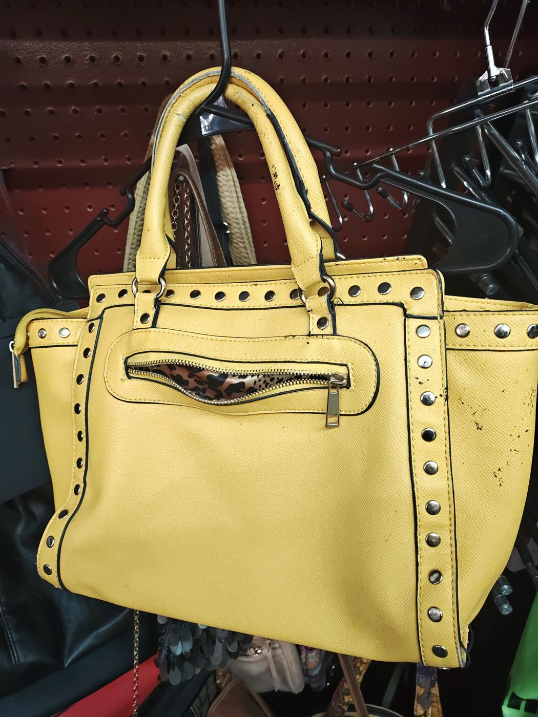 Yellow tote bag with studded trim